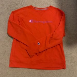 this is a red champion pullover size small